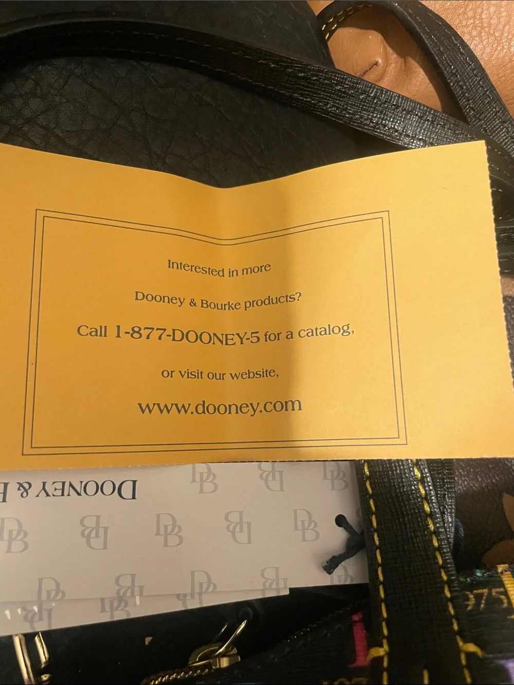 Dooney & Bourke Black Satchel with Multicolor DB Logo Print